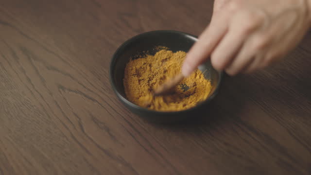mixing spicy powder