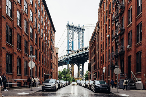 New York, USA - April 22, 2019:  Yellow taxi cabs speeding in Midtown Manhattan, New York City, United States.