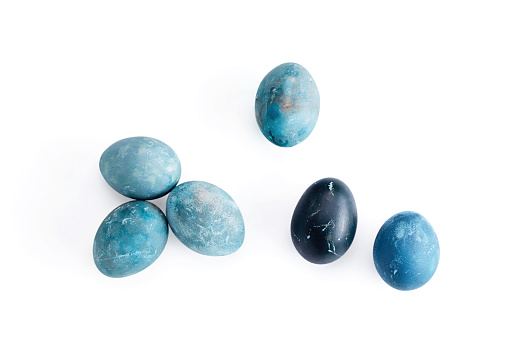 Blue easter eggs on white background