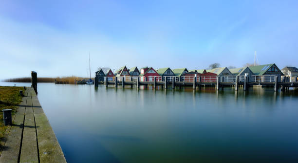 istock Boat houses in the inner harbour on the Bodden 1453646528
