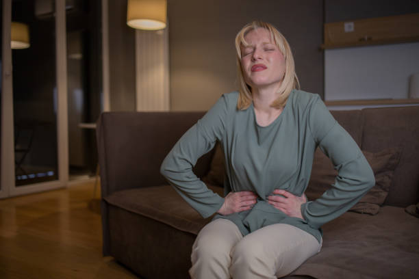 istock Young woman suffering from pain 1453646594