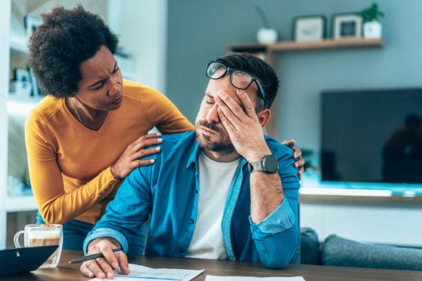 istock Couple doing their budget at home 1453648523