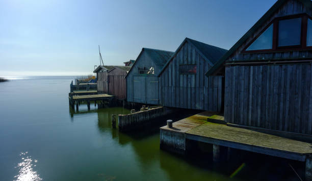 istock Boat houses in the inner harbour on the Bodden 1453650418