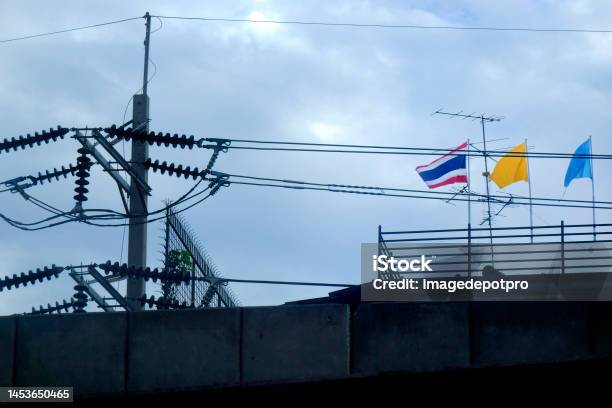 Thai Flag And Electricity Power Lines Stock Photo - Download Image Now - Amperage, Bangkok, Building Exterior