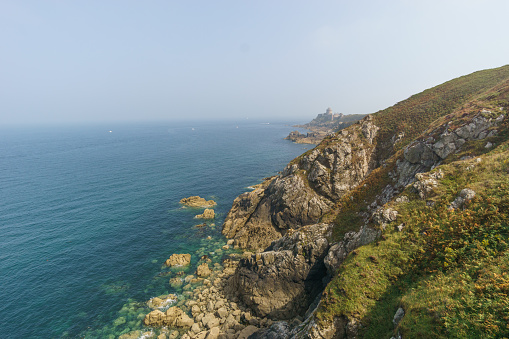 Beautiful view from Cap Frehel hills along the rocky coastline to fort la Latte, Brittany, France