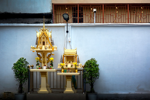 Close up shot of small temple model of buddhist spirit house in Bangkok, Thailand