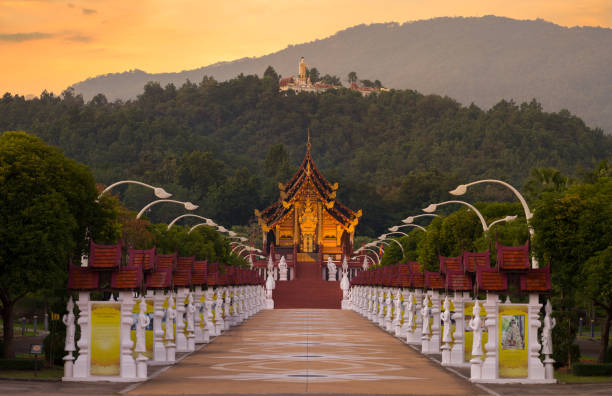 Grand Pavilion entrance way at sunset Chiang Mai, Thailand. 10 November 2022. Royal Flora Ratchaphruek Park  The temple of Grand Pavilion entrance way(Hor Kam Luang). chiang mai province stock pictures, royalty-free photos & images