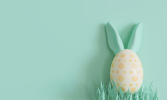 Green background with Easter egg, rabbit ears and copy space. Easter backdrop. Empty space for advertising text, invitation, logo. Postcard, greeting card design. Pascha, Happy Easter Day. 3D render