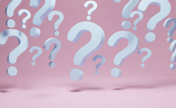 istock 3D rendering of white question marks against the pink background 1453654759