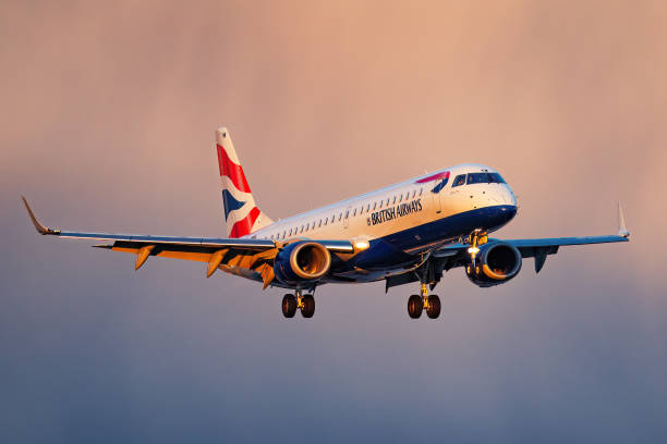 British Airways Embraer E190 landing at London City Airport British Airways Embraer E190 landing at London City Airport during sunset.

Date: May 24, 2022 british airways stock pictures, royalty-free photos & images