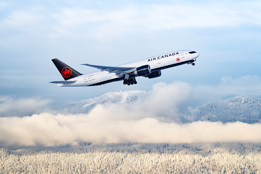 Air Canada Boeing 777 taking off from Vancouver International Airport.\n\nDate: Dec 28, 2021