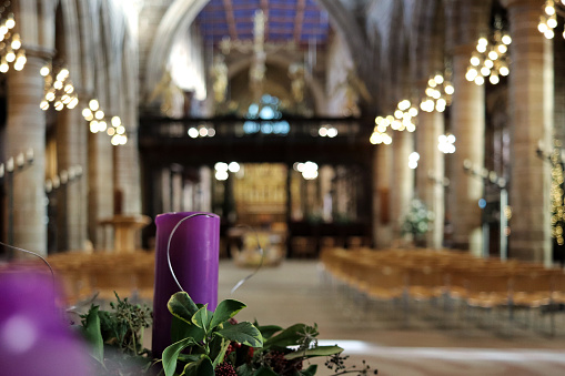 Close up of a font decorated for Christmas in an Anglican cathedral