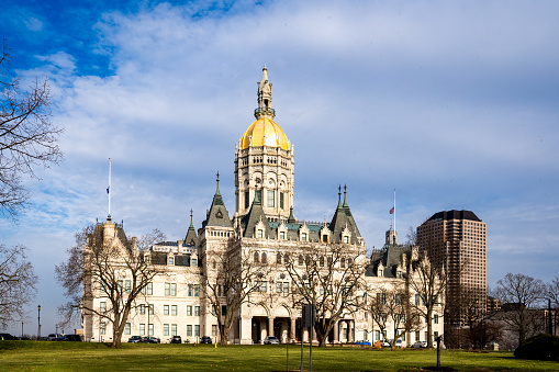 Hartford, CT - USA - Dec 28, 2022 Horizontal view of the historic Connecticut State Capitol, The Eastlake style building with a distinctive domed tower was built in 1878 by Upjohn and Batterson.