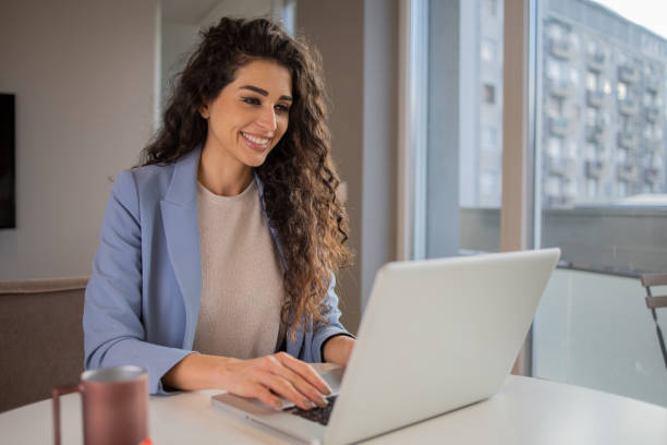 istock Young woman working from home 1453667193