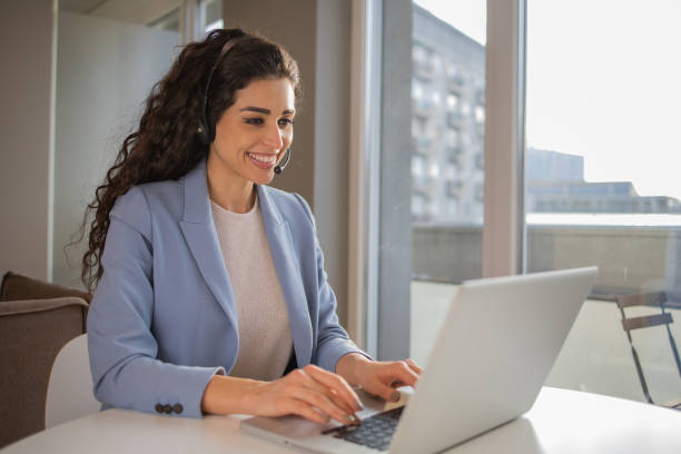 istock Young woman working from home 1453667227