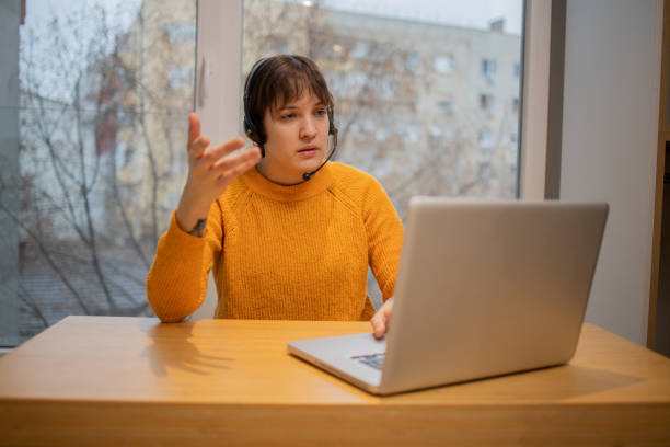 istock Young woman working from home 1453667291