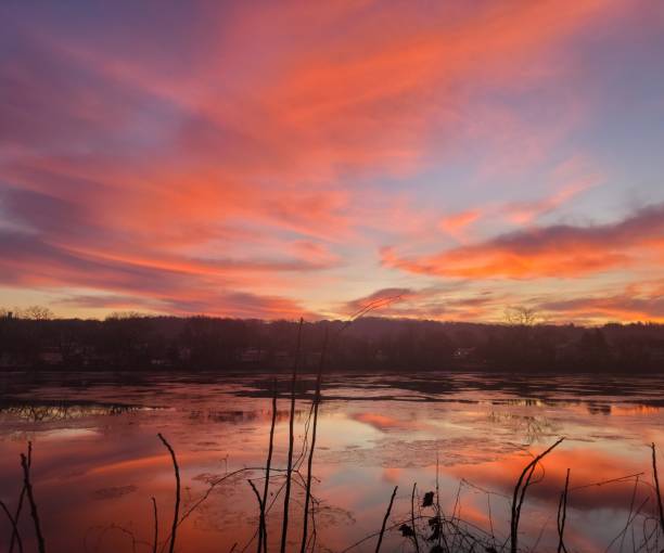 istock Winter Orange Sunrise over Hudson River in New York state 1453673106