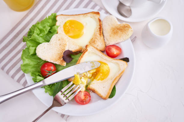 istock Fried Egg on Toast Bread and cup of fresh hot coffee on light grey background 1453676883