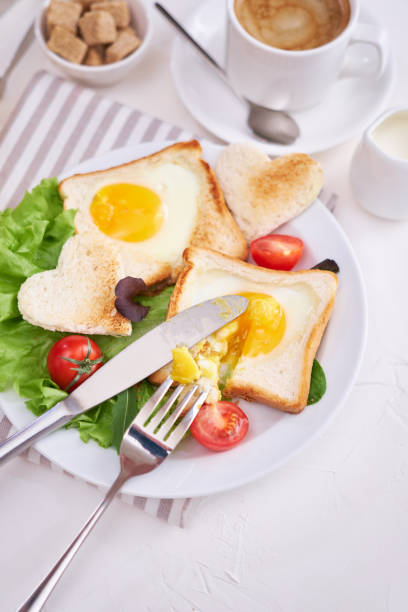 istock Fried Egg on Toast Bread and cup of fresh hot coffee on light grey background 1453676884