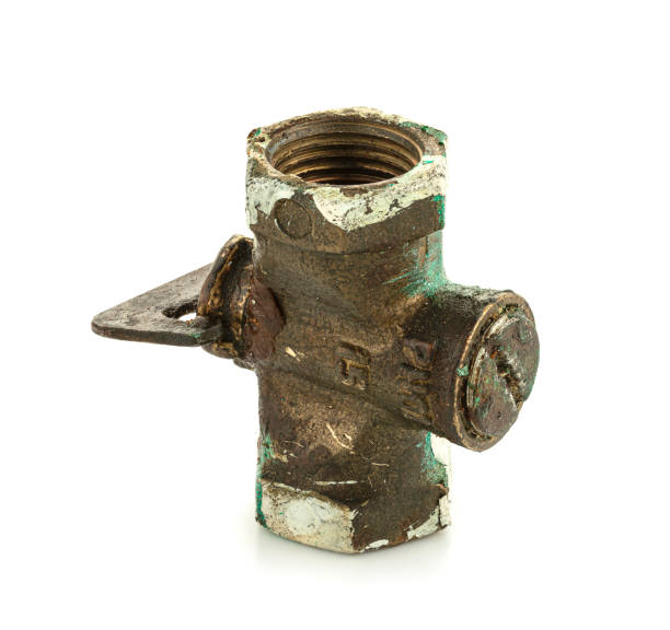istock Old metal faucet on white background 1453676919