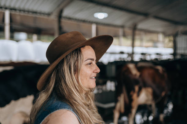 istock Dairy farmer woman 1453683086