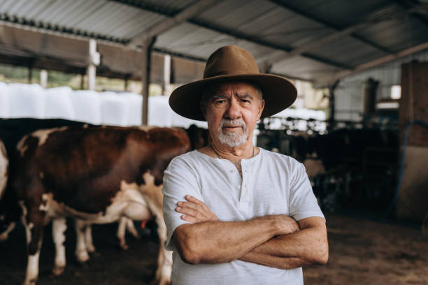istock Portrait of a dairy farmer 1453683170