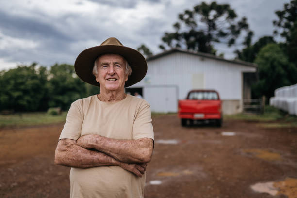 istock Senior farmer on his property 1453683173