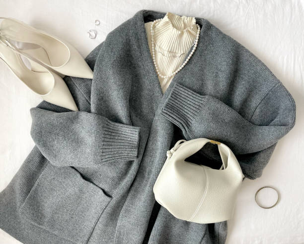 Gray cardigan knit coat and white items