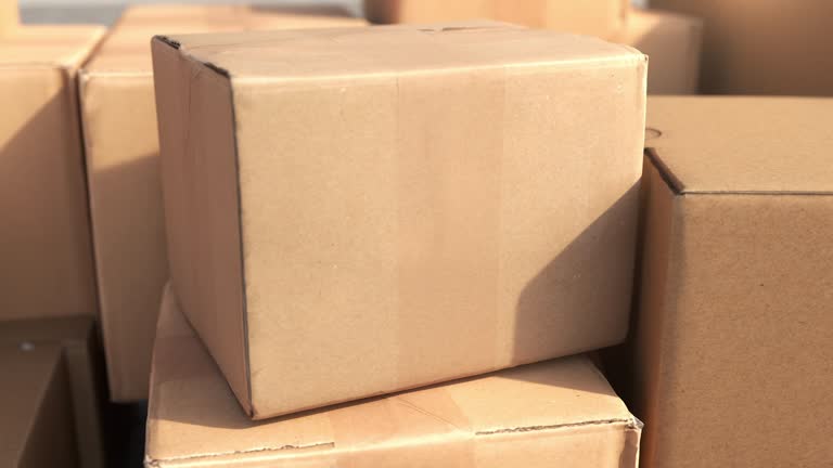 Closeup Slow motion Boxes, Parcel boxes, cardboard box, in factory industry. 3D animation. Business ecommerce logistic concept idea.