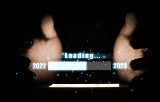 istock Hand holding virtual loading bar for count down from 2022 to 2023 year of preparation merry Christmas and happy new year concept. 1453695621