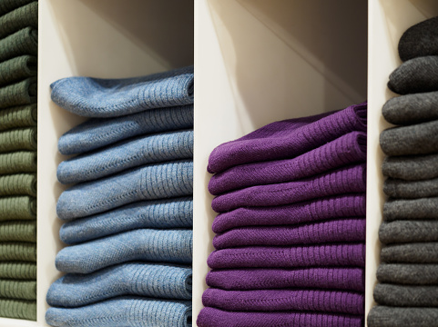 Colored cotton socks neatly placed on the shelf