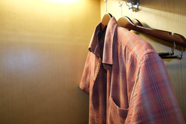 istock Flannel shirt left hanged inside wardrobe 1453702688