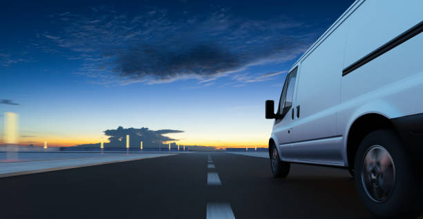 istock Van delivery on road at sunrise 1453704418