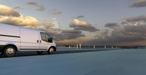 istock Van delivery on road at sunrise 1453704437