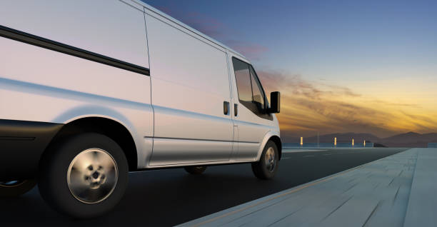 istock Van delivery on road at sunrise 1453704438