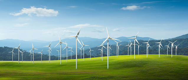 Wind turbines in a field with beautiful landscape. Sustainable, Ecological, Renewable power sources concept images