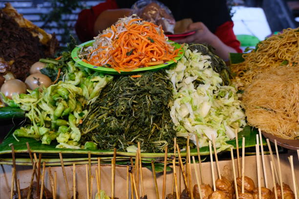 istock Stack of steamed vegetables, main ingredient for pecel, Indonesian traditional salad with peanut sauce 1453705295