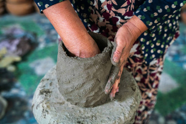 istock molding clay for making pottery vase 1453707148