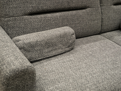 Partial Close-up of Grey Cloth Sofa