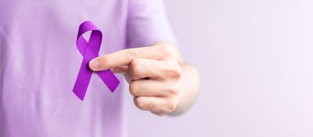 purple ribbon for cancer day, lupus, Pancreatic, Esophageal, Testicular cancer, world Alzheimer, epilepsy, Sarcoidosis, Fibromyalgia and domestic violence Awareness month concepts purple ribbon for cancer day, lupus, Pancreatic, Esophageal, Testicular cancer, world Alzheimer, epilepsy, Sarcoidosis, Fibromyalgia and domestic violence Awareness month concepts epilepsy stock pictures, royalty-free photos & images