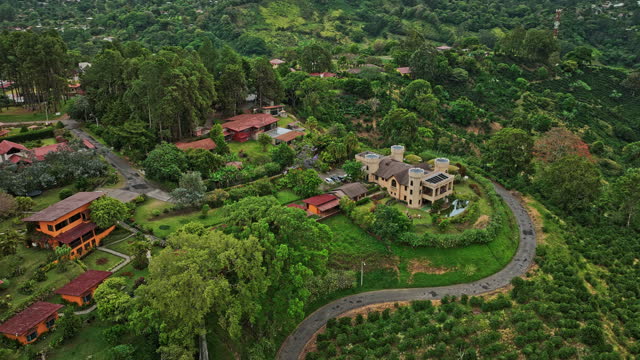 Boquete Panama Aerial v10 cinematic low birds eye view, fly around bambuda castle hostel surrounded by nature and coffee plantation at bajo lino, los naranjos - Shot with Mavic 3 Cine - April 2022