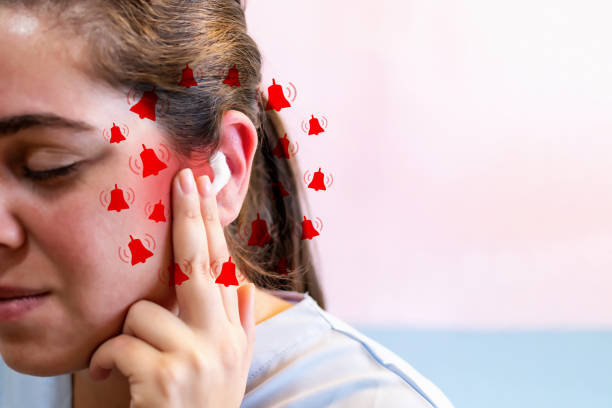 woman suffering earache or tinnitus, noise whistling in her ears. - tinitus imagens e fotografias de stock