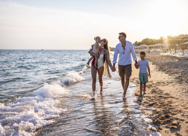 Family walking on the beach