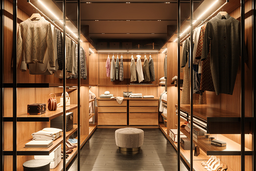Dressing Room Interior With Shoes, Bags And Hanging Clothes