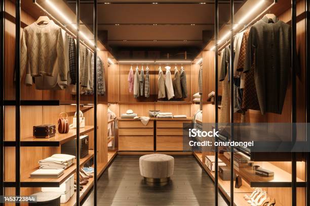 Dressing Room Interior With Shoes Bags And Hanging Clothes Stock Photo - Download Image Now