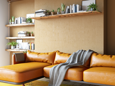 Cozy Room with Books Leather Sofa and Epty Beige Wall. 3D Render
