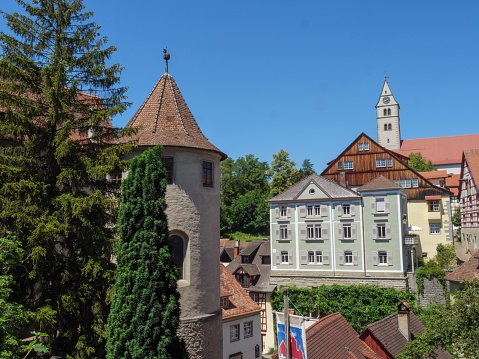 A view of old buildings with Parish Church of the Visitation of the Virgin Mary in the distance, Meersburg, Baden-Wurttemberg, Germany