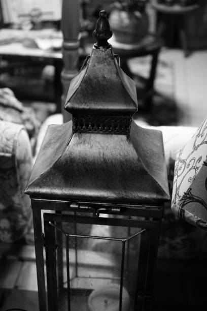 istock Grayscale of a lamp at the table 1453728983