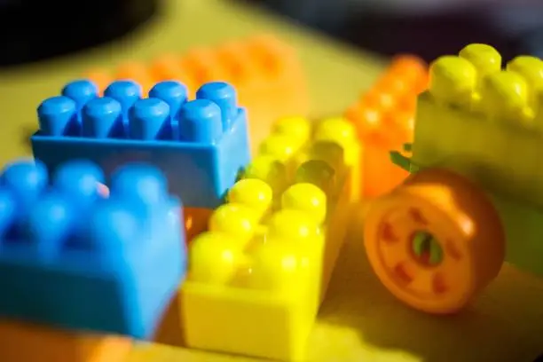 A closeup of colorful legos, kids' puzzle toys
