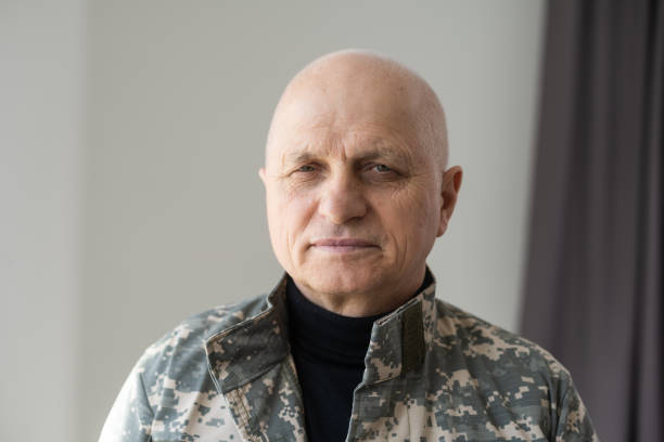 istock Portrait senior soldier in military uniform. 1453735743